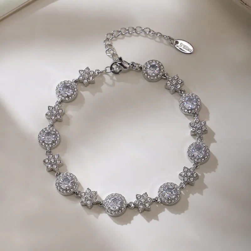 Ατσάλινο βραχιόλι με αστέρια και ζιργκόν σε ασημί τόνο (B1714)