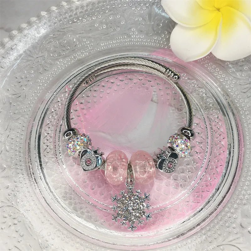 Βραχιόλι ατσάλινο χρώμα ασημί με κρεμαστά στοιχεία (B1376)