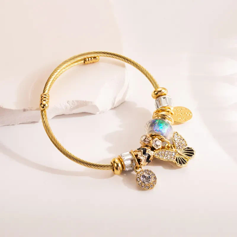 Ατσάλινο βραχιόλι με charms πεταλούδα (B1635)