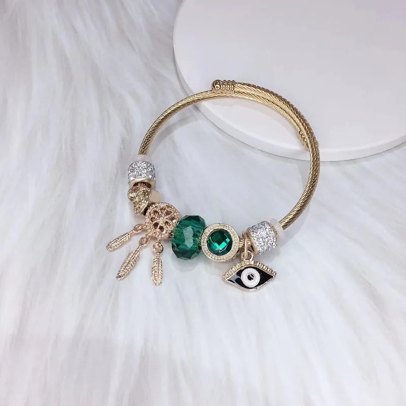 Ατσάλινο βραχιόλι με charms ματάκι (B1640)