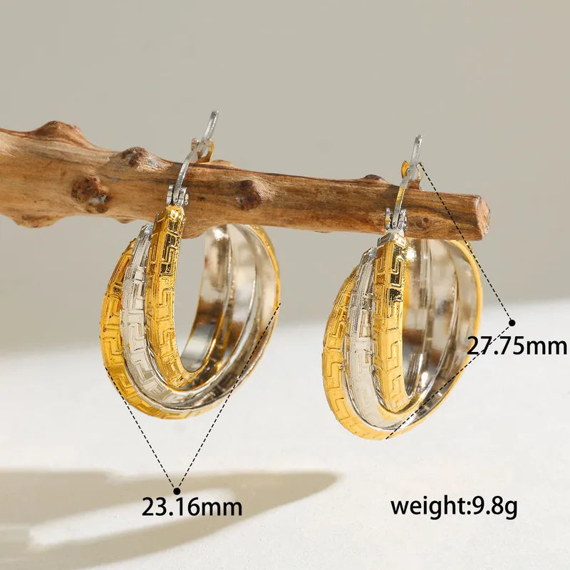 Ατσάλινα σκουλαρίκια κρίκοι ασημί - χρυσό 2.7cm (E1688)